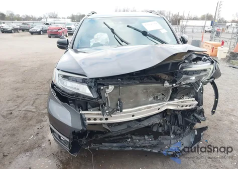 2019 Honda Passport Elite z USA, uszkodzony, nr VIN 5FNYF8H01KB006690